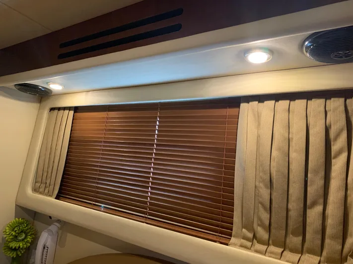 Tre Bella Yacht Photos Pics Interior of 2005 Sea Ray 390 Motor Yacht with blinds and lighting.