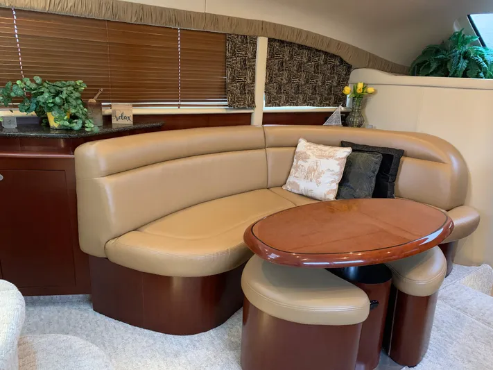 Tre Bella Yacht Photos Pics Luxurious interior of 2005 Sea Ray 390 Motor Yacht with elegant seating and decor.