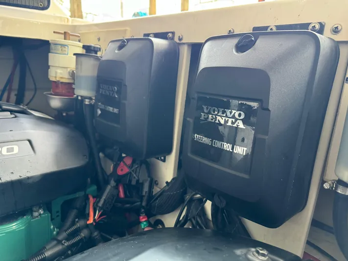 Clintessa Yacht Photos Pics Engine compartment of 2012 Regal 35 Sport Coupe with Volvo Penta steering control units.