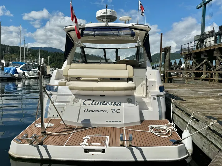 Clintessa Yacht Photos Pics 2012 Regal 35 Sport Coupe docked in Vancouver marina, rear view.
