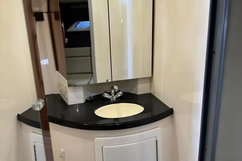 Clintessa Yacht Photos Pics 2012 Regal 35 Sport Coupe bathroom with modern sink and mirror.