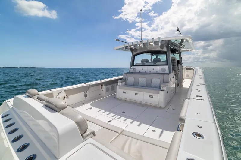  Yacht Photos Pics 2023 HCB 53 Sueños boat on open water under a clear blue sky.