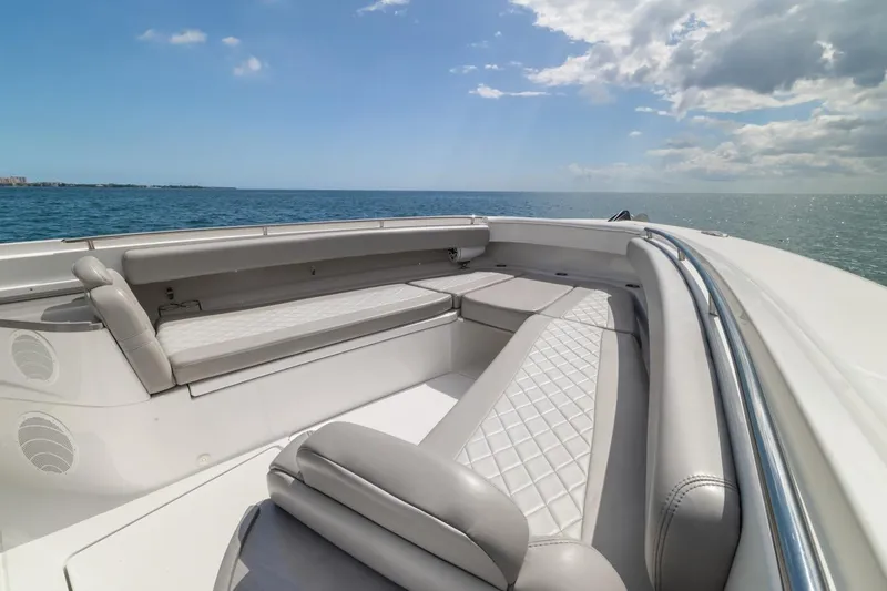  Yacht Photos Pics Luxurious seating on 2023 HCB 53 Sueños boat, ocean view, clear sky.