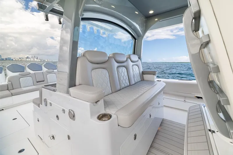  Yacht Photos Pics Luxurious seating on 2023 HCB 53 Sueños boat with ocean view.