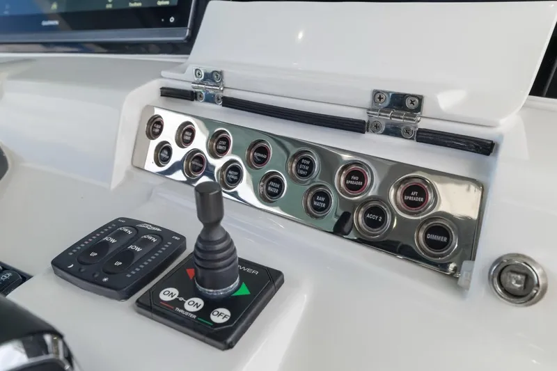  Yacht Photos Pics Control panel of 2023 HCB 53 Sueños boat with switches and joystick.