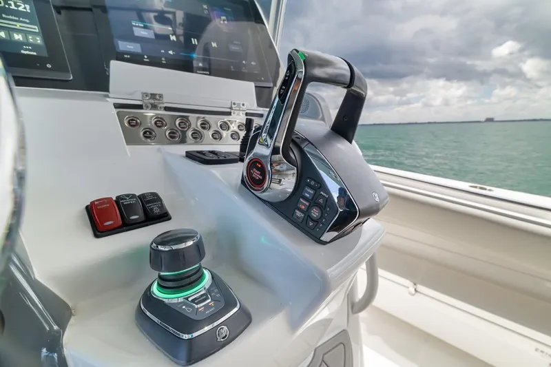  Yacht Photos Pics Control panel of 2023 HCB 53 Sueños boat with throttle and joystick.