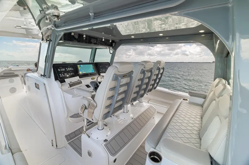  Yacht Photos Pics 2023 HCB 53 Sueños boat interior with modern helm and luxurious seating.