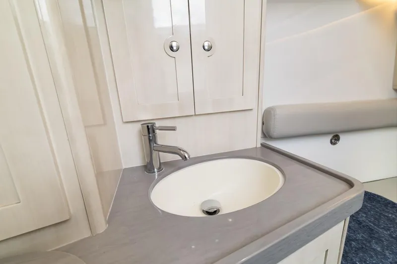  Yacht Photos Pics Luxury bathroom sink in 2023 HCB 53 Sueños yacht, featuring sleek design and modern fixtures.