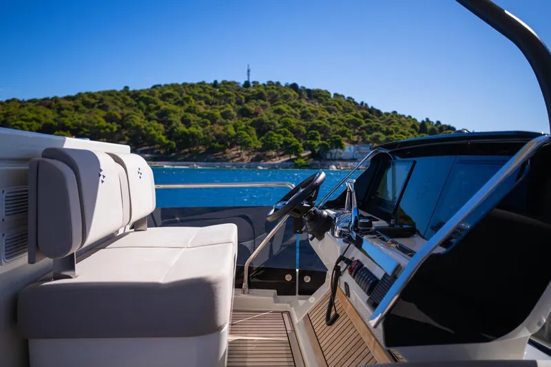 Leena Yacht Photos Pics Luxurious 2023 Prestige X60 yacht interior with scenic ocean view.