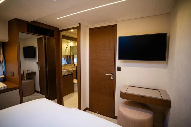 Leena Yacht Photos Pics Luxurious interior of 2023 Prestige X60 yacht with modern furnishings and sleek design.