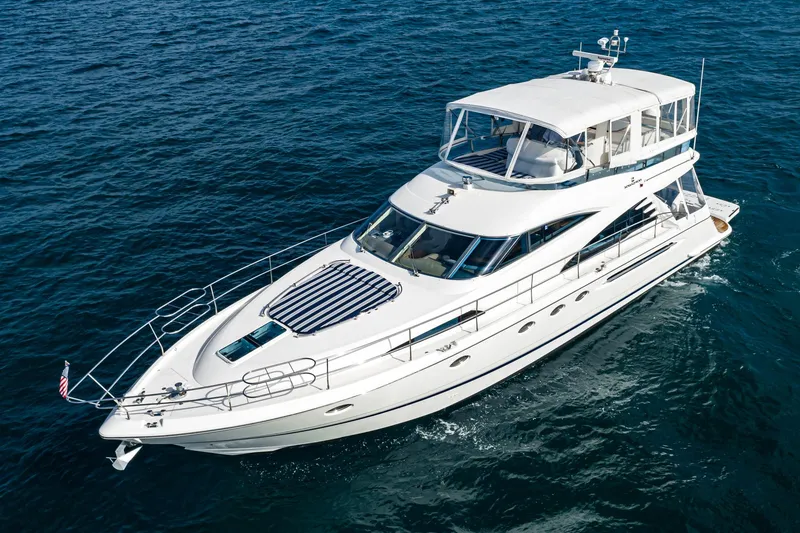 Desperado Yacht Photos Pics 2002 Fairline Squadron 58 yacht cruising on open water.