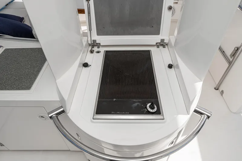 Desperado Yacht Photos Pics Outdoor grill on 2002 Fairline Squadron 58 yacht deck, featuring sleek design and modern amenities.