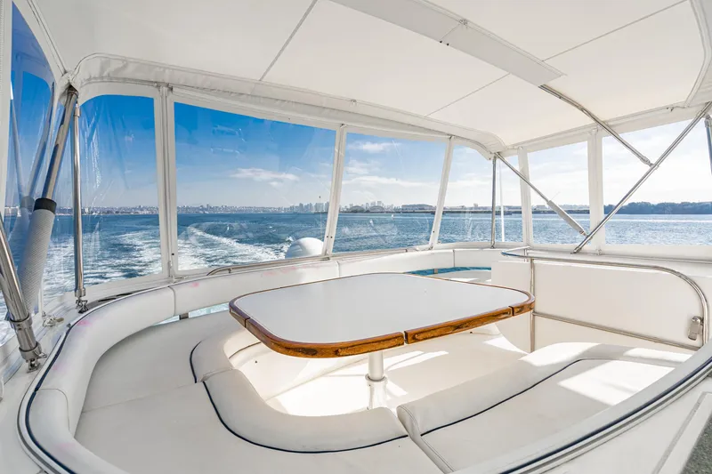 Desperado Yacht Photos Pics Luxurious 2002 Fairline Squadron 58 yacht interior with panoramic ocean views.