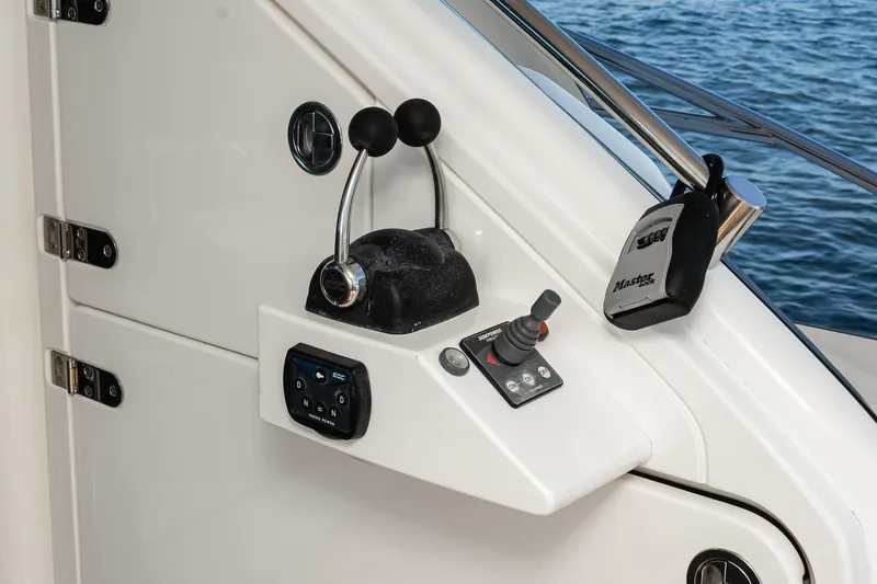 Desperado Yacht Photos Pics Control panel of 2002 Fairline Squadron 58 yacht with throttle and joystick.