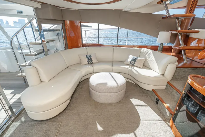 Desperado Yacht Photos Pics Luxurious interior of 2002 Fairline Squadron 58 yacht with elegant seating and ocean view.