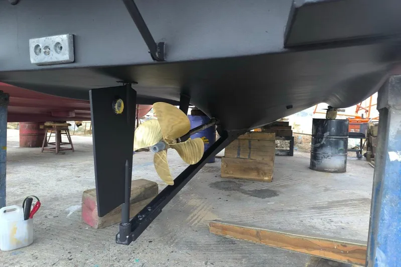  Yacht Photos Pics Underwater view of 2009 Jeanneau Merry Fischer 925 boat propeller and rudder.