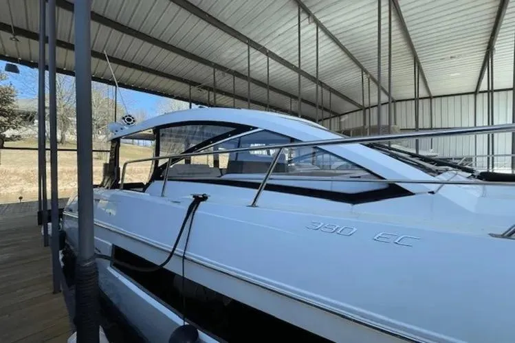  Yacht Photos Pics 2018 Cruisers Yachts 390 Express Coupe docked in covered marina.