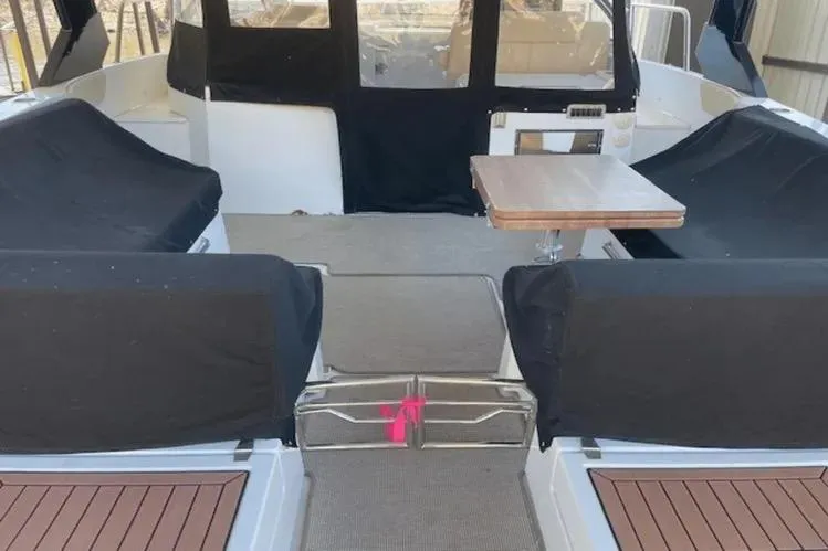  Yacht Photos Pics 2018 Cruisers Yachts 390 Express Coupe interior with seating and table.