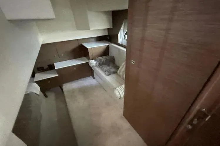  Yacht Photos Pics Interior of 2018 Cruisers Yachts 390 Express Coupe, featuring cozy seating and modern cabinetry.