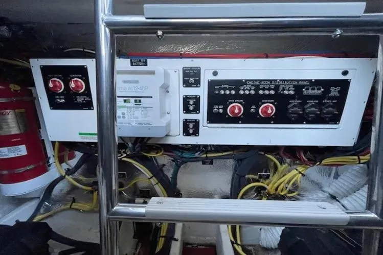  Yacht Photos Pics Engine room of 2018 Cruisers Yachts 390 Express Coupe with control panels and wiring.