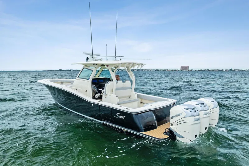Prime Tyme Yacht Photos Pics 2020 Scout 355 LXF boat with triple Mercury engines on open water.