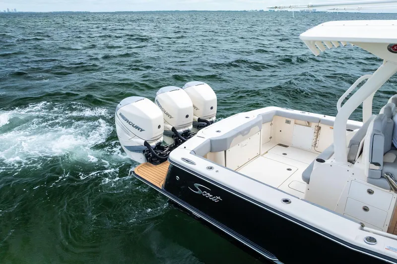 Prime Tyme Yacht Photos Pics 2020 Scout 355 LXF boat with triple Mercury outboard engines on open water.