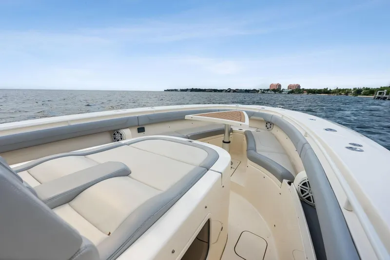 Prime Tyme Yacht Photos Pics 2020 Scout 355 LXF boat interior with luxurious seating on open water.