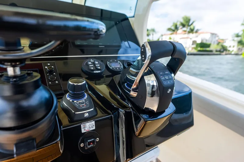 Prime Tyme Yacht Photos Pics Control panel of 2020 Scout 355 LXF boat with modern navigation equipment.