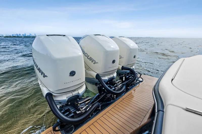 Prime Tyme Yacht Photos Pics 2020 Scout 355 LXF boat with triple Mercury outboard engines on the water.