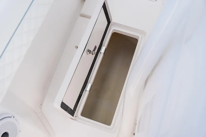  Yacht Photos Pics Open storage compartment on 2018 Intrepid 327 Center Console boat.