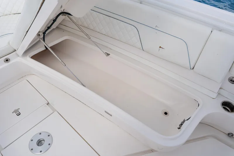  Yacht Photos Pics Open storage compartment on 2018 Intrepid 327 Center Console boat.
