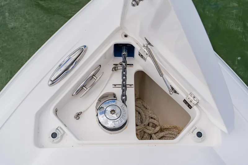  Yacht Photos Pics Anchor compartment of 2018 Intrepid 327 Center Console boat with chain and rope.