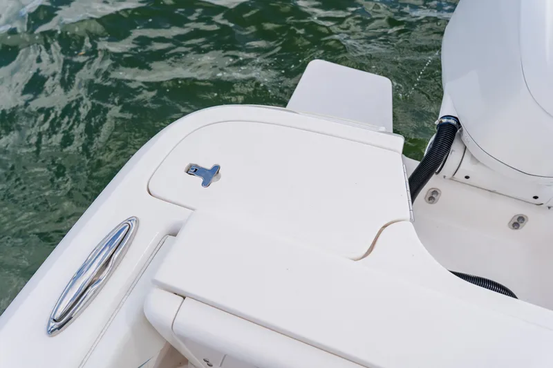  Yacht Photos Pics 2018 Intrepid 327 Center Console boat detail with water backdrop.
