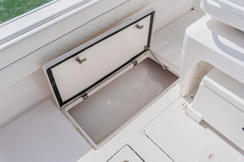  Yacht Photos Pics Open storage compartment on 2018 Intrepid 327 Center Console boat.