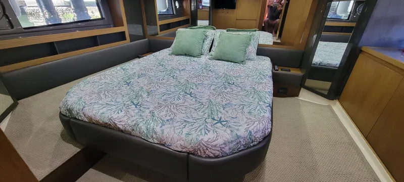  Yacht Photos Pics Luxurious bedroom interior of 2013 Azimut Atlantis 44 yacht with elegant bedding.