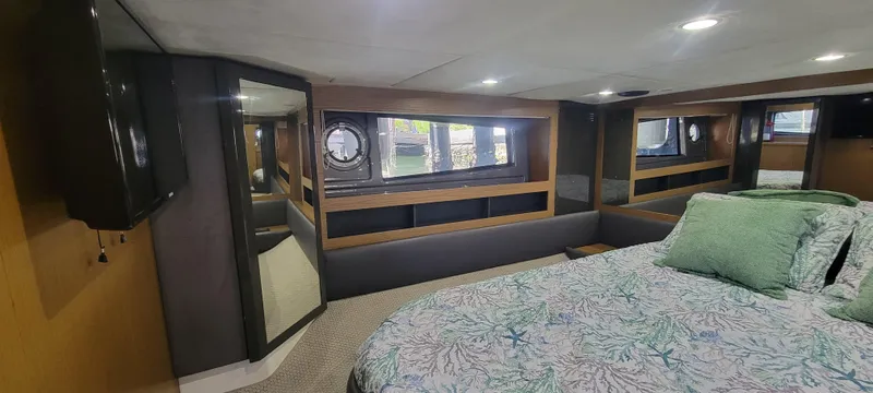  Yacht Photos Pics Luxurious interior of 2013 Azimut Atlantis 44 yacht with elegant bedding and modern design.