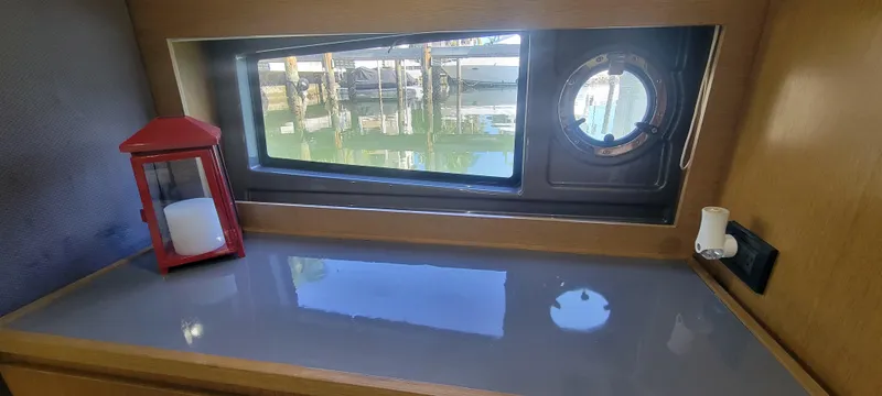  Yacht Photos Pics Interior of 2013 Azimut Atlantis 44 yacht with window and red lantern.