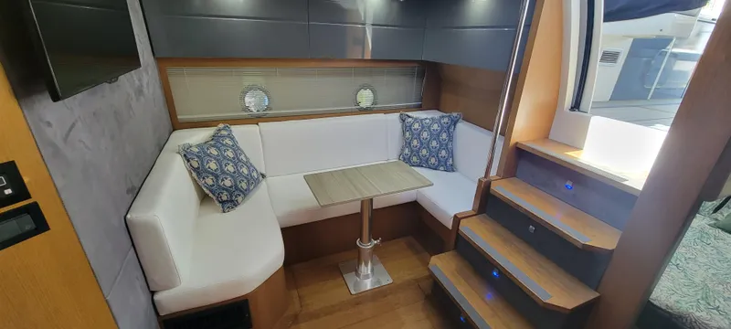  Yacht Photos Pics Interior of 2013 Azimut Atlantis 44 yacht with cozy seating and modern decor.