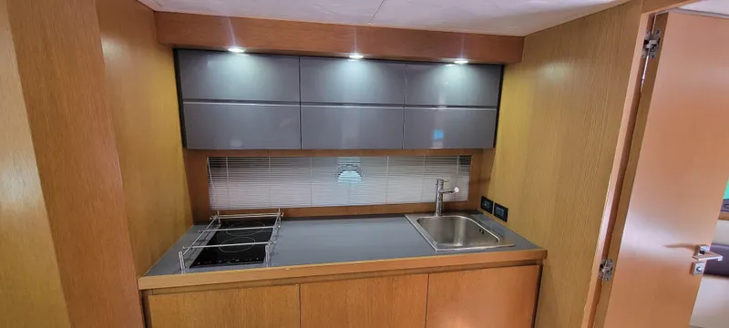  Yacht Photos Pics Modern kitchen in 2013 Azimut Atlantis 44 yacht with sleek cabinetry and sink.