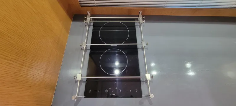  Yacht Photos Pics Modern stovetop in 2013 Azimut Atlantis 44 yacht kitchen.