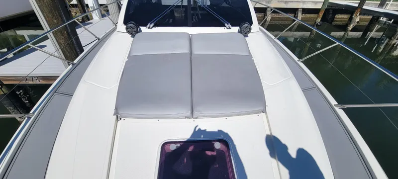  Yacht Photos Pics Azimut Atlantis 44 yacht deck, 2013 model, featuring sunbathing cushions and sleek design.