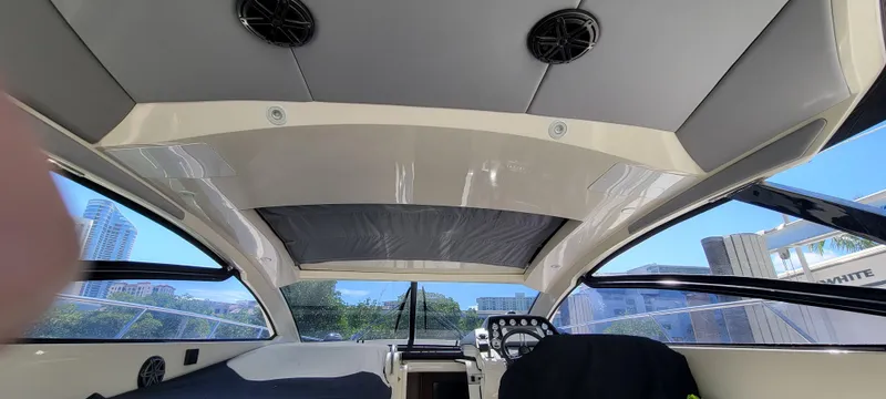  Yacht Photos Pics Interior view of 2013 Azimut Atlantis 44 yacht, showcasing sleek design and modern cockpit.