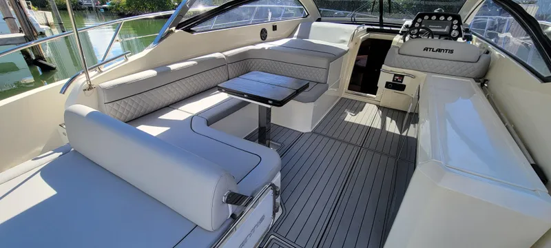  Yacht Photos Pics Luxurious interior of 2013 Azimut Atlantis 44 yacht with elegant seating and sleek design.