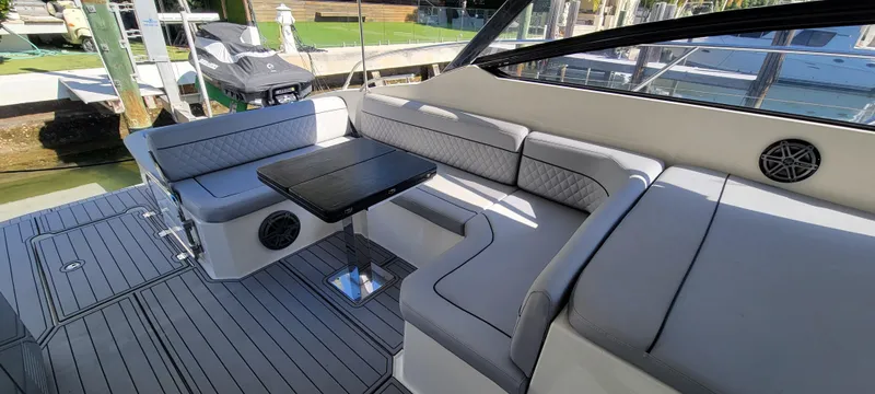  Yacht Photos Pics 2013 Azimut Atlantis 44 yacht interior with sleek seating and table.