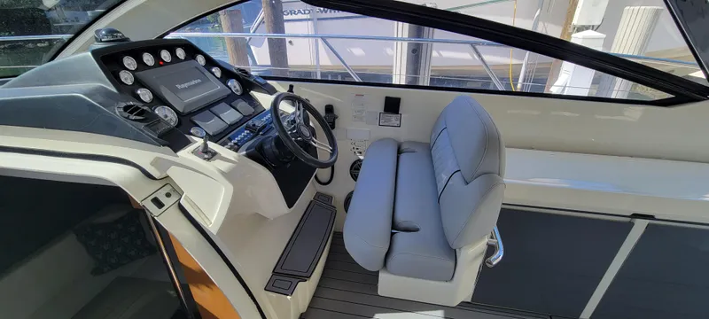  Yacht Photos Pics 2013 Azimut Atlantis 44 yacht cockpit with modern steering and controls.