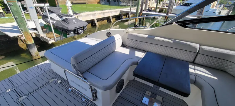  Yacht Photos Pics 2013 Azimut Atlantis 44 yacht with elegant seating and sleek design at a marina.