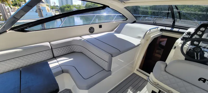  Yacht Photos Pics Interior of 2013 Azimut Atlantis 44 yacht with luxurious seating and modern design.