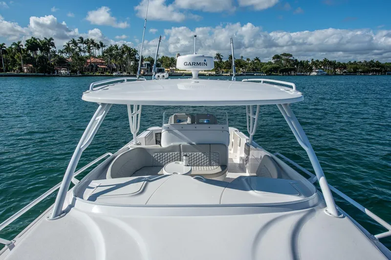  Yacht Photos Pics 2022 Intrepid 409 Valor boat on calm water with clear skies.