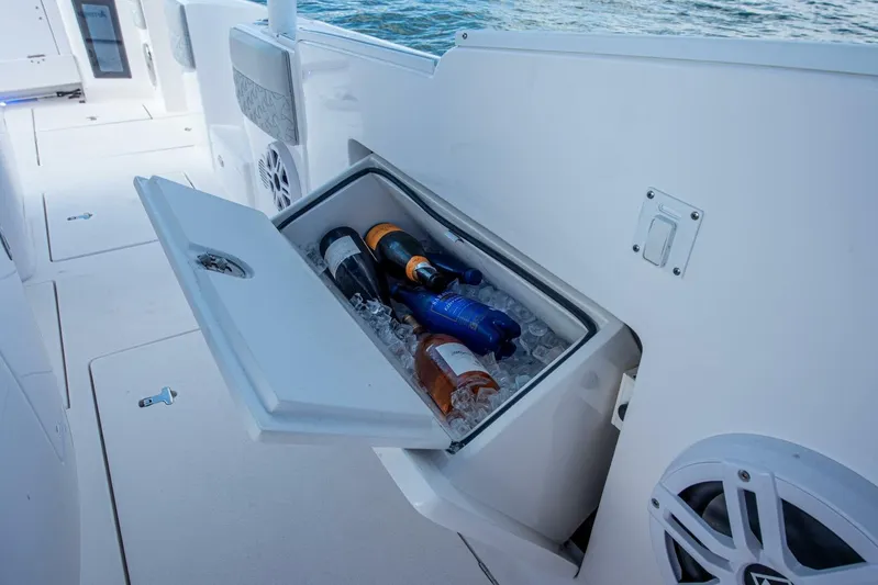  Yacht Photos Pics 2022 Intrepid 409 Valor boat with built-in cooler, bottles on ice.