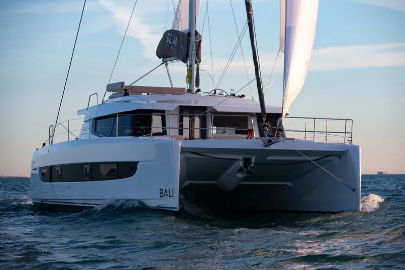  Yacht Photos Pics 2026 Bali 4.4 catamaran sailing on open water, showcasing modern design and spacious deck.